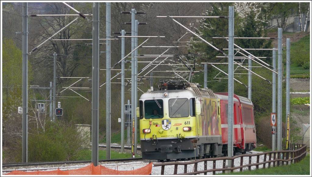 RE1244 nach Disentis mit Ge 4/4 II 611  Landquart  auf der  Neubaustrecke  bei Chur West. (21.04.2010)