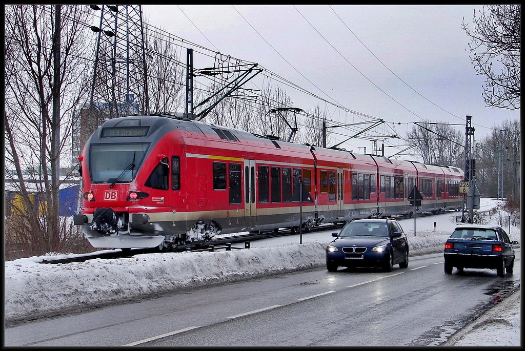 RE33308 verlsst die Insel Rgen und fhrt in den Bhf Stralsund- Rgendamm ein. am 22.02.10 