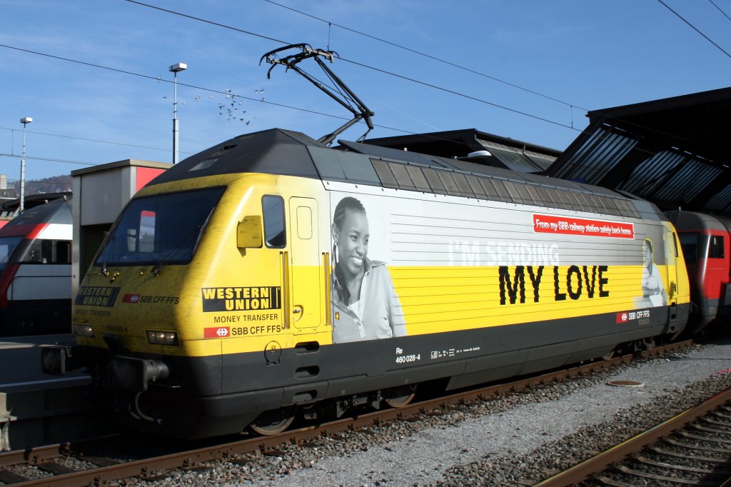 Re460 028-4 zieht den IC mitdefekten Steuerwagen, hinten schiebt Re460 043-3. Aufgenommem in Zrich HB am 01.11.2009.