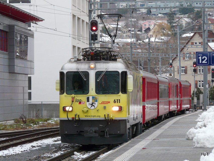 RhB - Ge 4/4 611 vor Schnellzug bei der einfahrt in den Bahnhof Chur am 04.12.2009