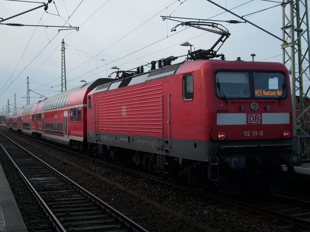 Rostocker 112 111 am 27.November 2009 als Schublok an einer Regionalbahn Sassnitz-Rostock in Bergen/Rgen.