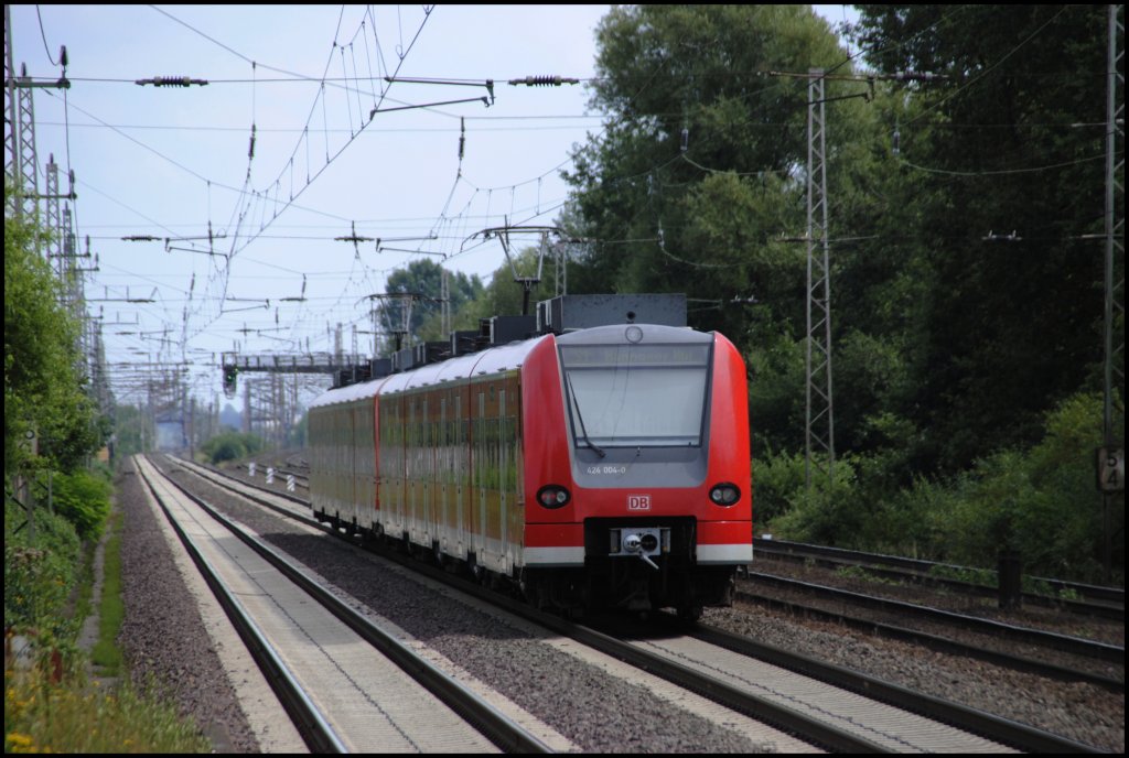 S-Bahnverband der BR 424 fhrt von Dedensen-Gmmer in Richtung Hannover, am 10.08.2010.