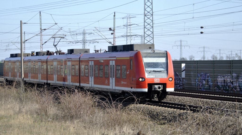 S-Bahnzug der BR 424 in Ahlten am 25.03.2012.