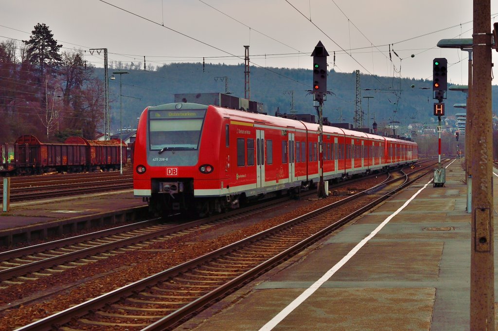 S1 nach Osterburken bei der Ausfahrt aus dem Bahnhof Neckarelz am Sonntag den 31.3.2013
