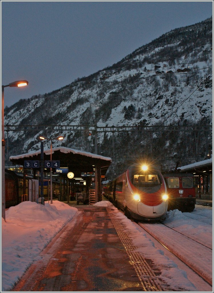 SBB ETR 610 als EC 35 von Genve nach Milano beim Halt in Birg. 
12.12.12