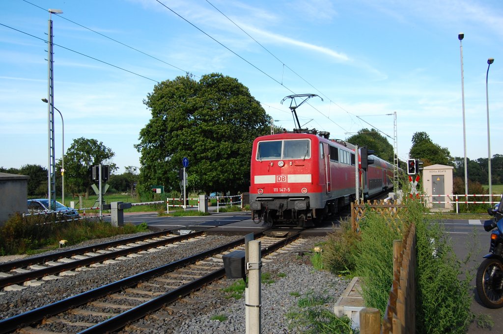 Schiebung betreibt hier 111 147-5 bei einem RE 4 Zug auf der KBS 485 bei Wrm. 6.9.2010