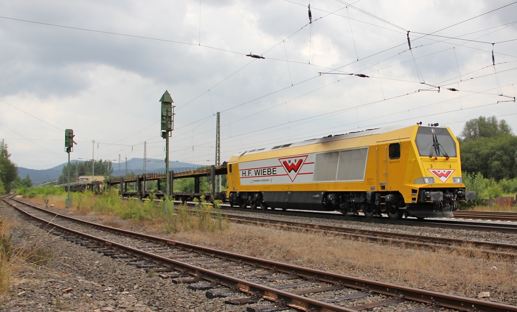Seltenheit: Wiebe's 264 011-8 mit ARS Autotransportwagen in Fahrtrichtung Sden. Aufgenommen am 21.07.2011 in Eschwege West.