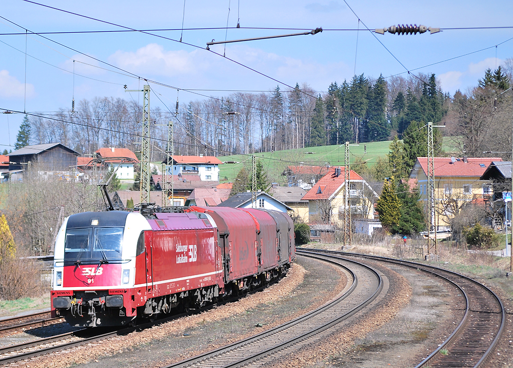 SLB 91 - 1216 940 - an der Spitze des Stahlzuges 47209 bei der Durchfahrt in Hallwang-Elixhausen.