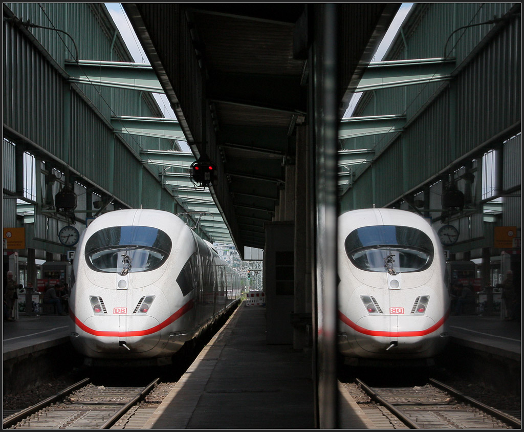 Starker Kontrast II - 

Auch hier führt die direkte Beleuchtung des hellen ICE 3 zu einem starken Kontrast zum schattigen Bahnhofsbereich drumherum. In einer Werbevitrine spiegelt sich die Ausfahrt des Zuges. Bei beiden Aufnahmen musste man aufpassen, den ICE nicht über zu belichten. 

Stuttgart Hauptbahnhof, 05.06.2012 (Ma)