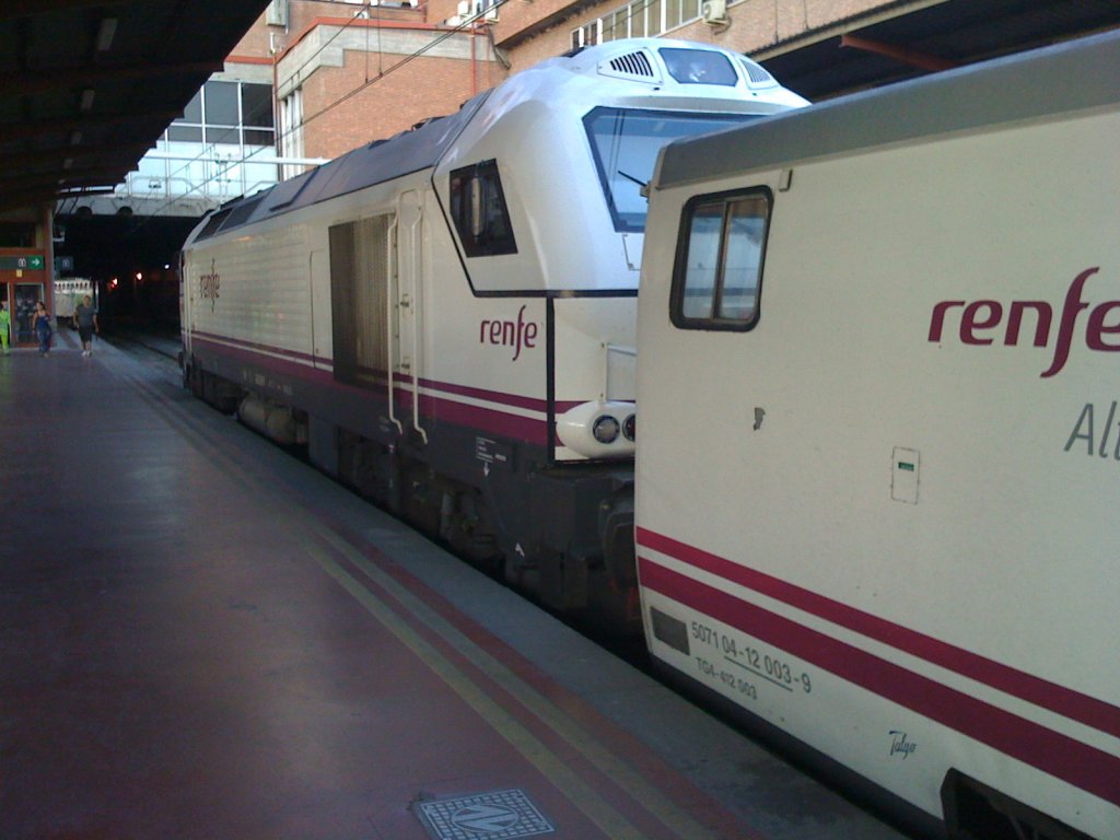 Talgo Madrid Chamartin to Almeria with Renfe 334 in Grandes Lineas livery, here before departure at Madrid Chamartin in the morning of 14 August 2009. 