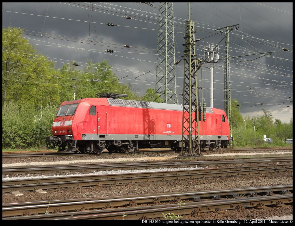 Typisches Aprilwetter: 145 035 rangiert in Kln-Gremberg (12.04.2011)