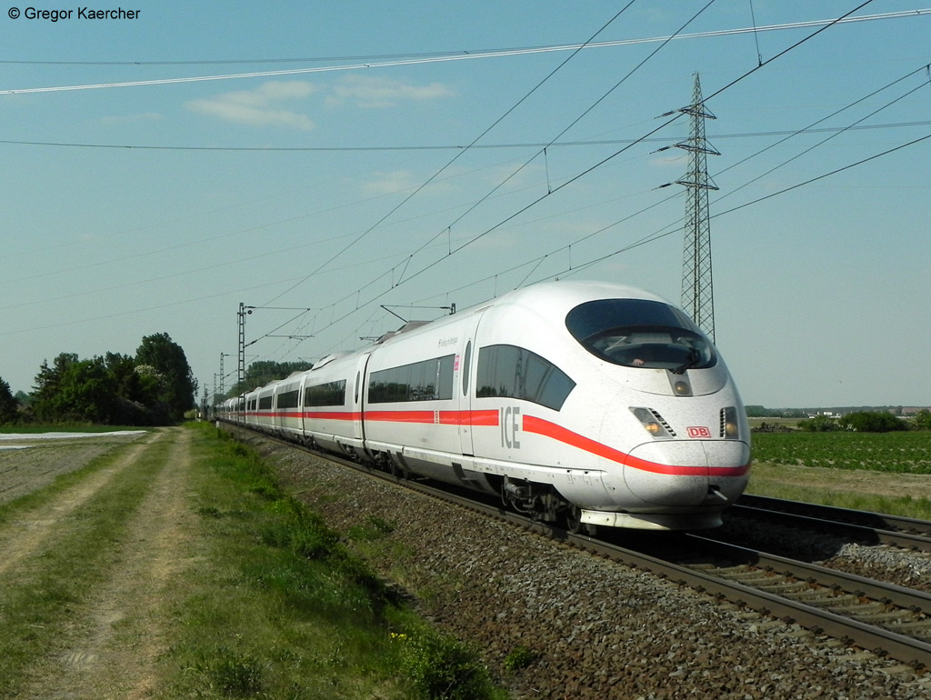 Tz 301 (403 001-1)  Freiburg  und Tz 323 (403 023-5)  Schaffhausen  unterwegs als ICE 209 von Kln bis nach Basel SBB. Aufgenommen am 25.04.2011 bei Lampertheim.