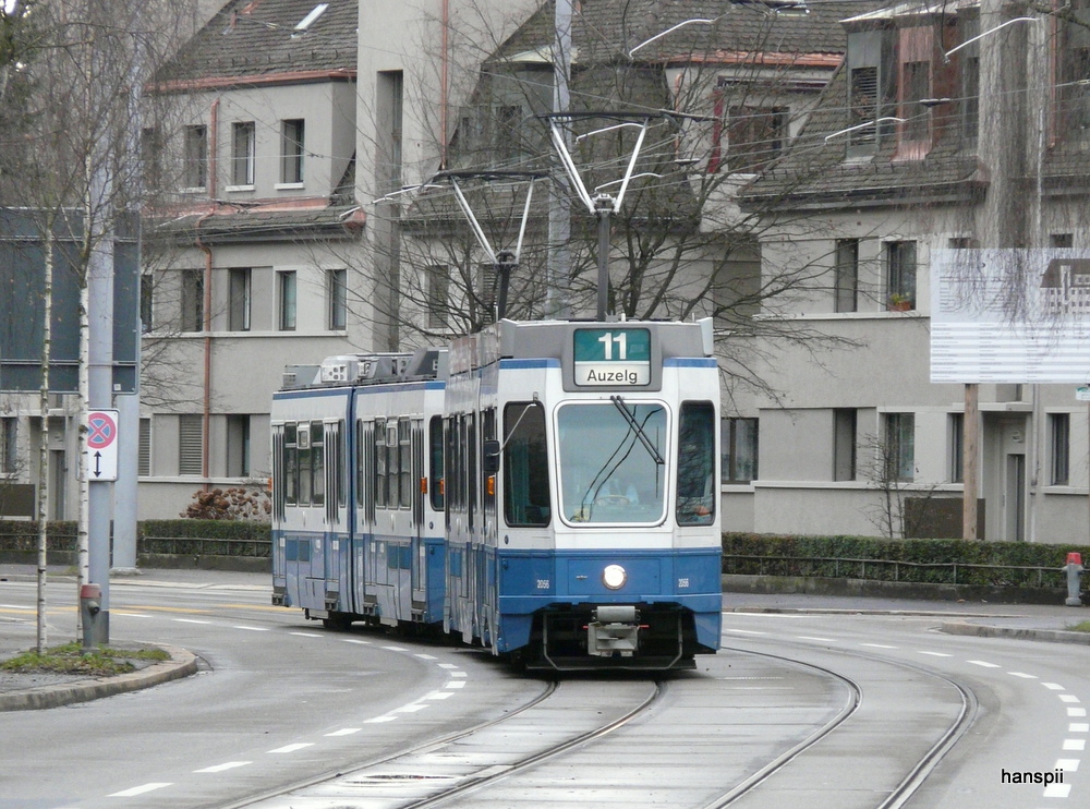 VBZ - Tram Be 4/6  2056 und Be 4/6 unterwegs auf der Linie 11 in Zrich am 23.12.2012