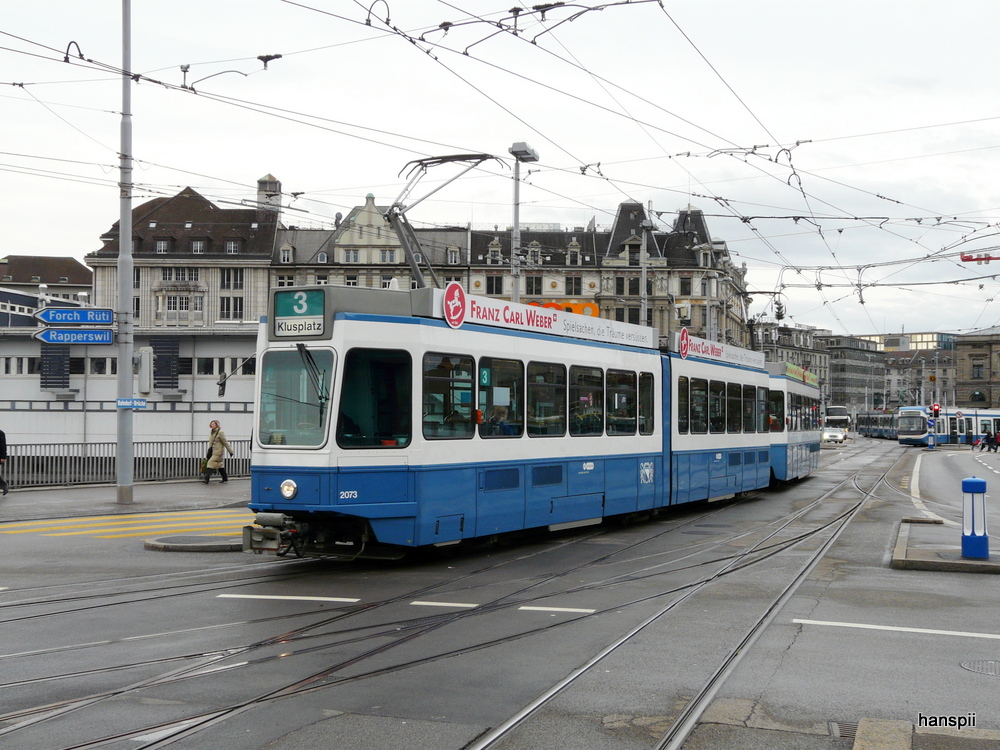 VBZ - Tram Be 4/6  2073 und Be 4/6 unterwegs auf der Linie 3 in Zrich am 23.12.2012