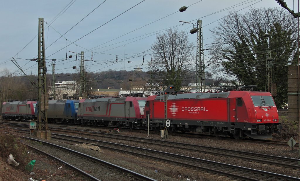 Vier abgestellte Crossrail-Lok`s am 26.01.2012 in Aachen West. Fotografiert von der Brenstrasse. Die mit der neuen Lackierung 185 596-4  Suzy  steht vor 185 594-9, 145-CL 204 und 185 601-2.