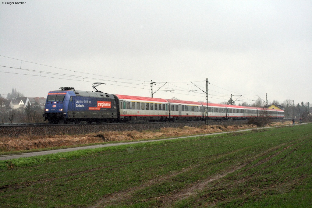 Whrend eines Schneeschauer fhrt 101 100-6  Energiewende  mit dem IC 118 Innsbruck-Mnster dem nchsten Halt Heidelberg Hbf entgegen. Aufgenommen am 08.02.2013 bei Bad Langenbrcken.