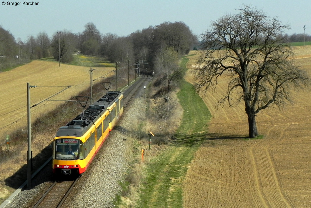 Wagen 856 im neuen Look mit AVG-Logo und Wagen 870 als S4 Eilzug nach Karlsruhe am 25.03.2012 bei Wssingen.