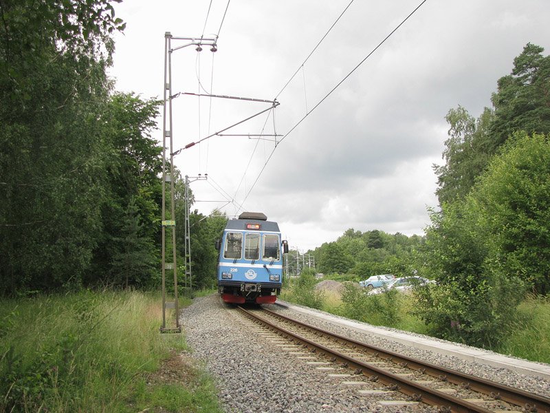 X10p-226 als Linie L28 in Hgerns (Gemeinde Tby), 14.07.2009