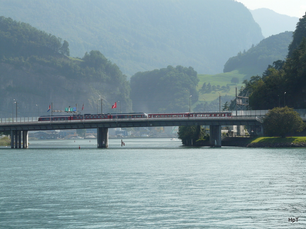 zb- Triebzug ABe 130 ... mit verstrkung unterwegs bei Stansstad am 10.09.2012