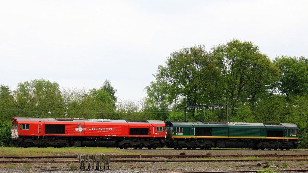 Zwei Class 66 PB12  Marleen  von Crossrail und die PB15 von Railtraxx BVBA stehen in Montzen-Gare(B) bei Sonne und Wolkenlcken am 20.5.2013.