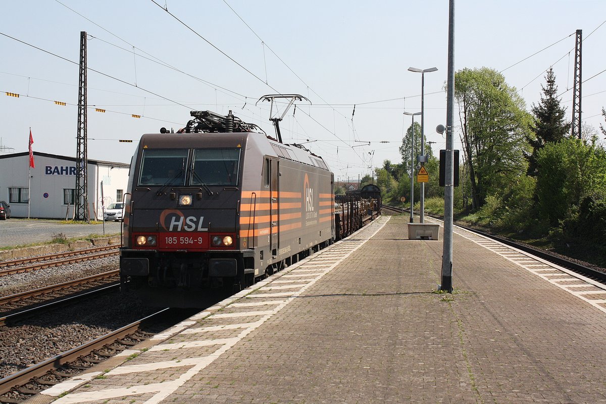 # Roisdorf 6
Die 185 594-9 der HSL mit einem Güterzug aus Koblenz/Bonn kommend durch Roisdorf bei Bornheim in Richtung Köln.

Roisdorf
20.04.2018