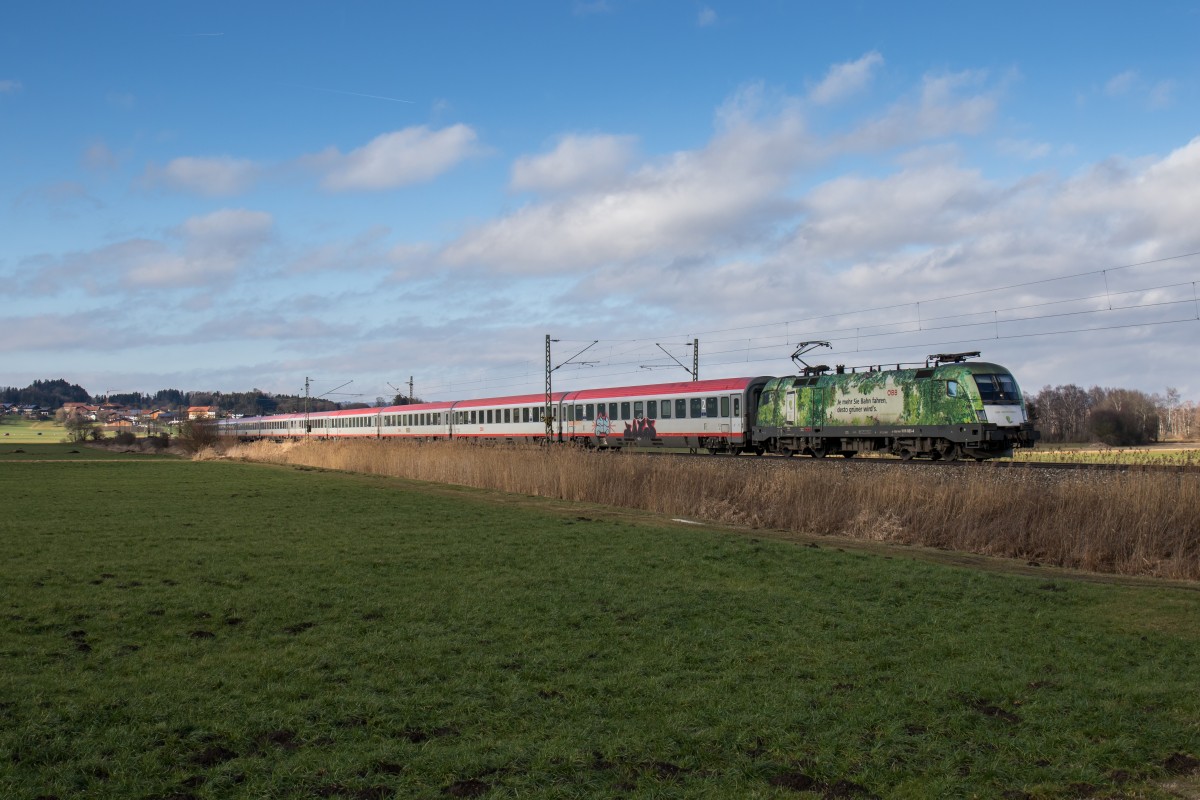 1016 023  GreenPoints  mit dem EC 113 am 29. Januar 2016 bei Bernau am Chiemsee.