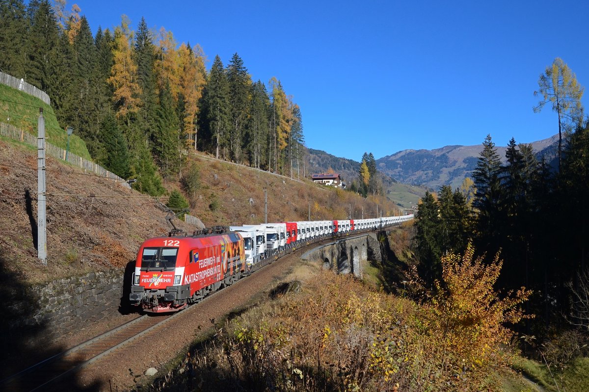 1016 048 mit einem Ganzzug am 03.11.2015 bei Bad Hofgastein.