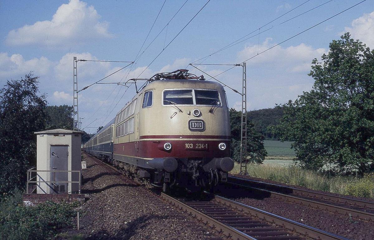 103234 am 13.7.1987 um 17.45 Uhr in Tecklenburg - Leeden mit Intercity 609  Heinrich Heine  nach Frankfurt.