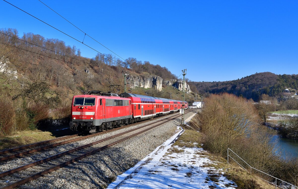 111 055 mit einer RB am 08.02.2023 bei Hagenacker.