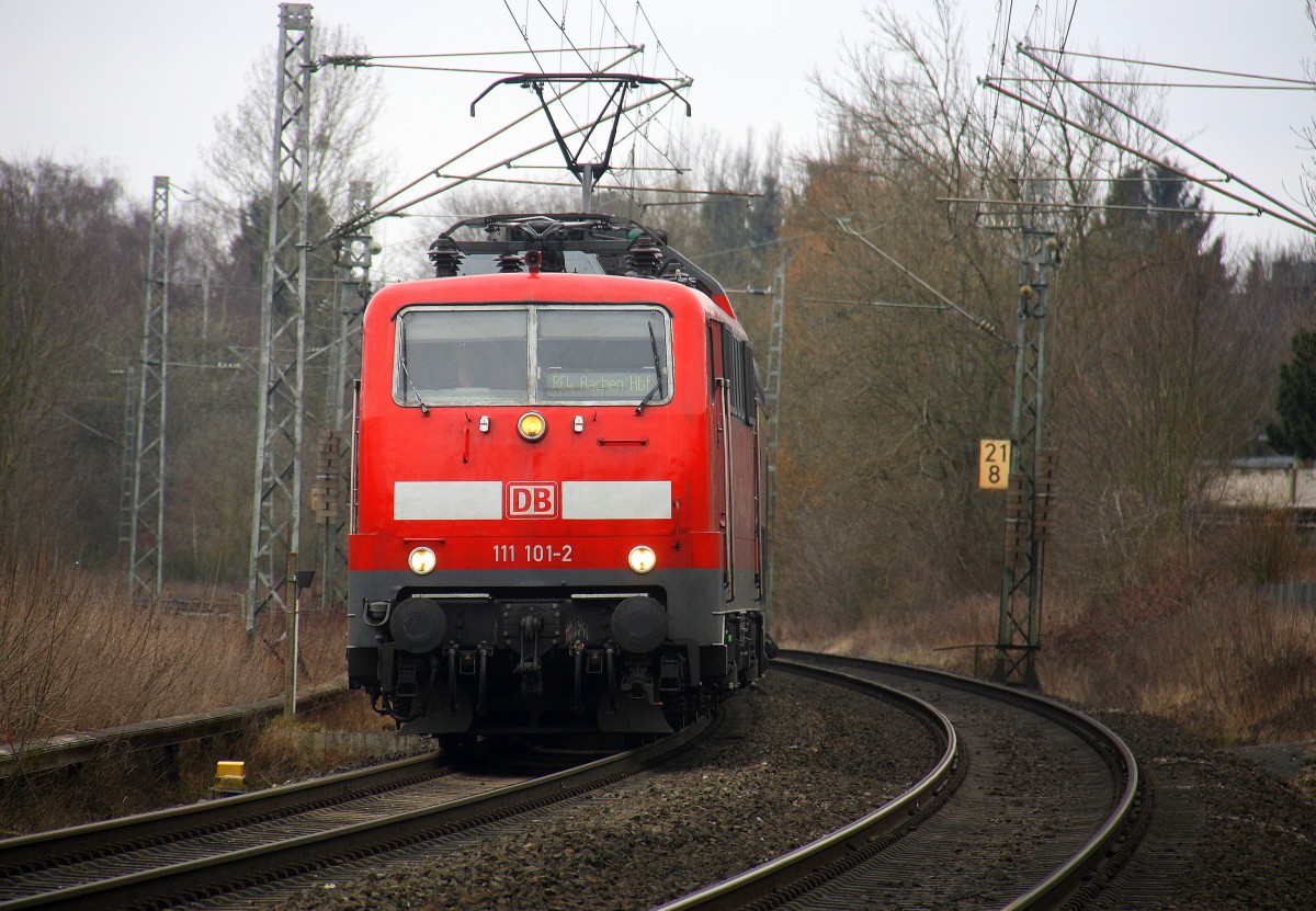 111 101-2 DB kommt mit dem RE4 aus Dortmund-Hbf nach Aachen-Hbf und kommt aus Richtung Rheydt,Wickrath,Beckrath,Herrath,Erkelenz,Baal,Hückelhoven-Baal,Brachelen,,Lindern,Süggerrath,Geilenkirchen,Frelenberg,Zweibrüggen und hat gerade eben in Übach-Palenberg gehalten und fährt weiter in Richtung Finkenrath,Hofstadt,Herzogenrath,Kohlscheid,Richterich,Laurensberg,Aachen-West,Aachen-Schanz,Aachen-Hbf. 
Aufgenommen am Bahnübergang in Rimburg im Wurmtal.
Bei Wolken am Kalten 19.3.2016.