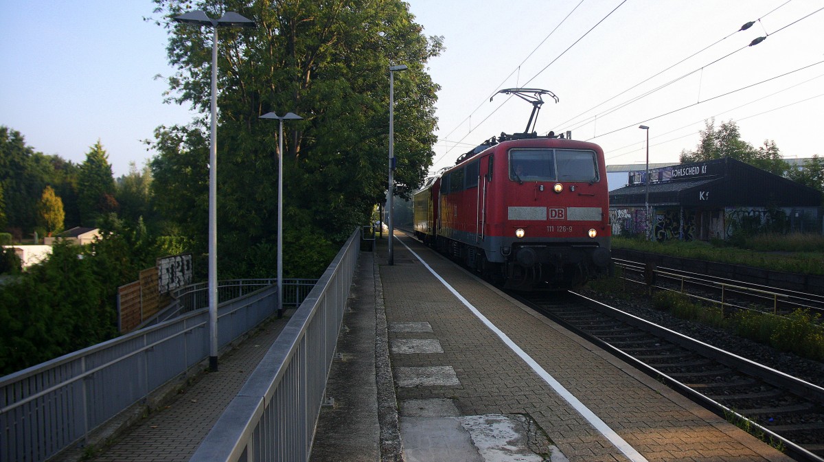 111 126-9 und 146 002 beide von DB kommen als Lokzug aus Richtung Neuss,Herzogenrath und fahren  die Kohlscheider-Rampe hoch nach Aachen-West und kommen durch Kohlscheid und fahren in Richtung  Richterich,Laurensberg,Aachen-West. 
Bei schönem Sonnenschein am Morgen vom 9.9.2015.