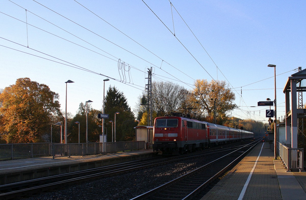 111 150-9 DB kommt durch Kohlscheid aus Richtung Aachen-West mit eienem RE4  Verstärkerzug von Aachen-Hbf nach Düsseldorf-Hbf und fährt in Richtung Herzogenrath,Neuss. 
Bei schönem Herbstwetter am Morgen vom 2.11.2015.
