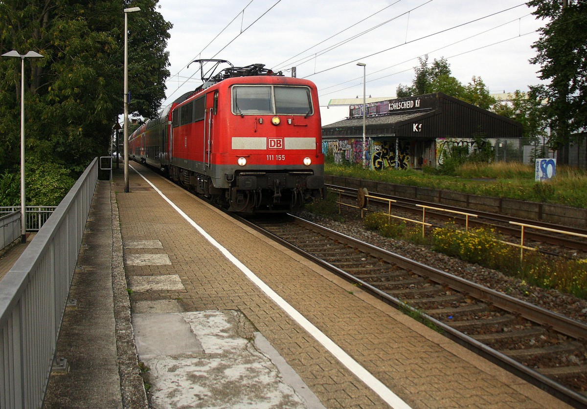111 155  DB kommt die Kohlscheider-Rampe hoch aus Richtung Neuss,Herzogenrath mit dem RE4 aus Dortmund-Hbf nach Aachen-Hbf und fährt durch Kohlscheid in Richtung Richterich,Laurensberg,Aachen-West. 
Bei Wolken am 21.9.2015.