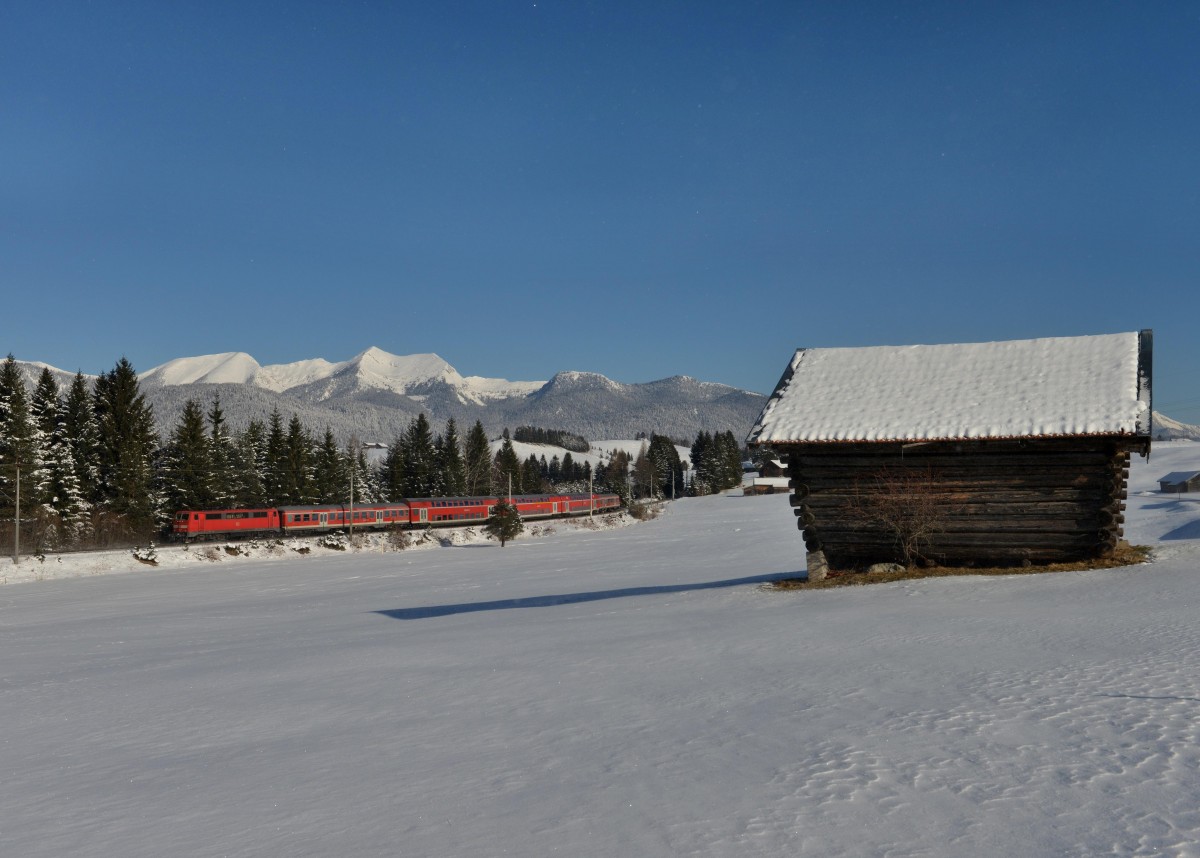 111 167 mit einer RB am 16.03.2013 bei Schmalenseehhe.