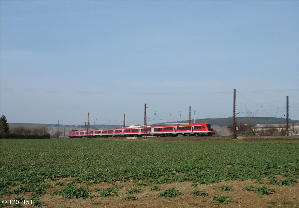 111 213-5 schiebt am 17.Mrz 2015 den RE 4615 bei Retzbach-Zellingen in Richtung Wrzburg.