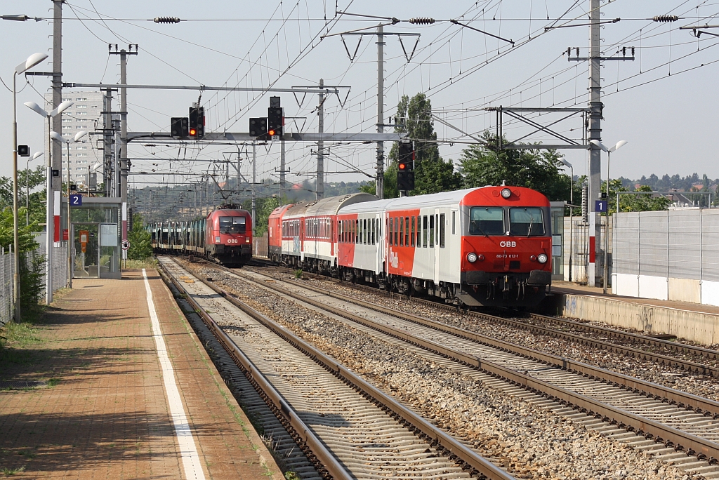 1116 027-4 und REX 2508 mit dem 80-73 012-1 an der Spitze am 24.Juli 2015 in der Hst. Haidestraße  