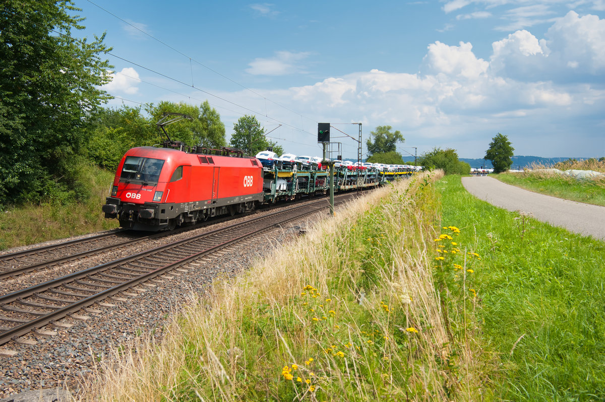 1116 069 mit einem Audizug bei Pölling Richtung Nürnberg, 14.07.2018