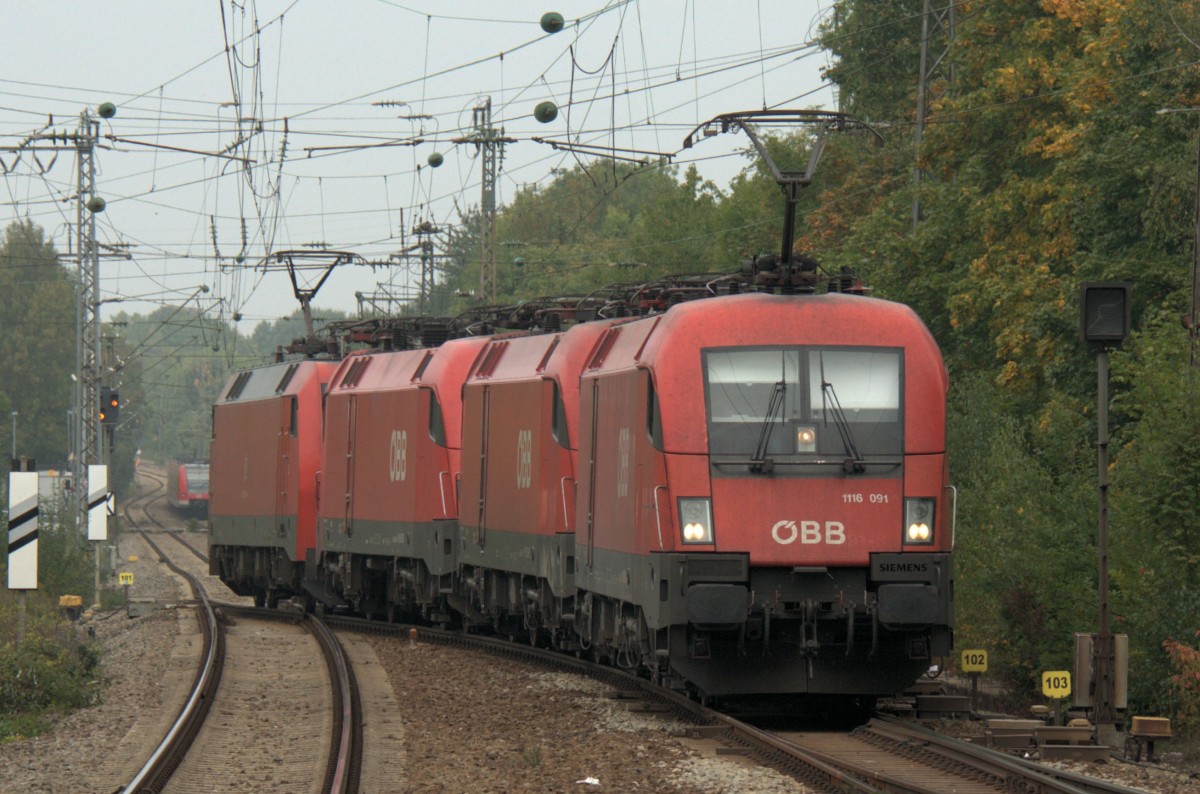 1116 091 mit 050 & 197 sowie 152 043 am 28.09.13 in München-Daglfing