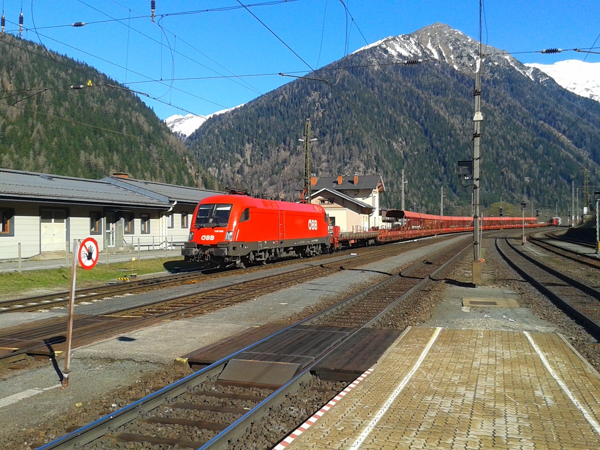 1116 099-3 mit ASTB 9609 von Böckstein bei der Einfahrt in den Bahnhof Mallnitz-Obervellach. (19.4.2015)