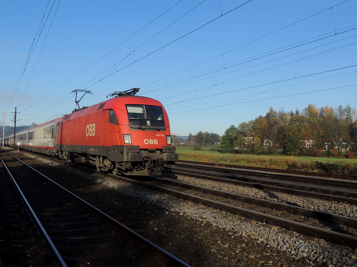 1116 102-5 passiert mit OIC-861 den Bahnhof Redl-Zipf; 130224