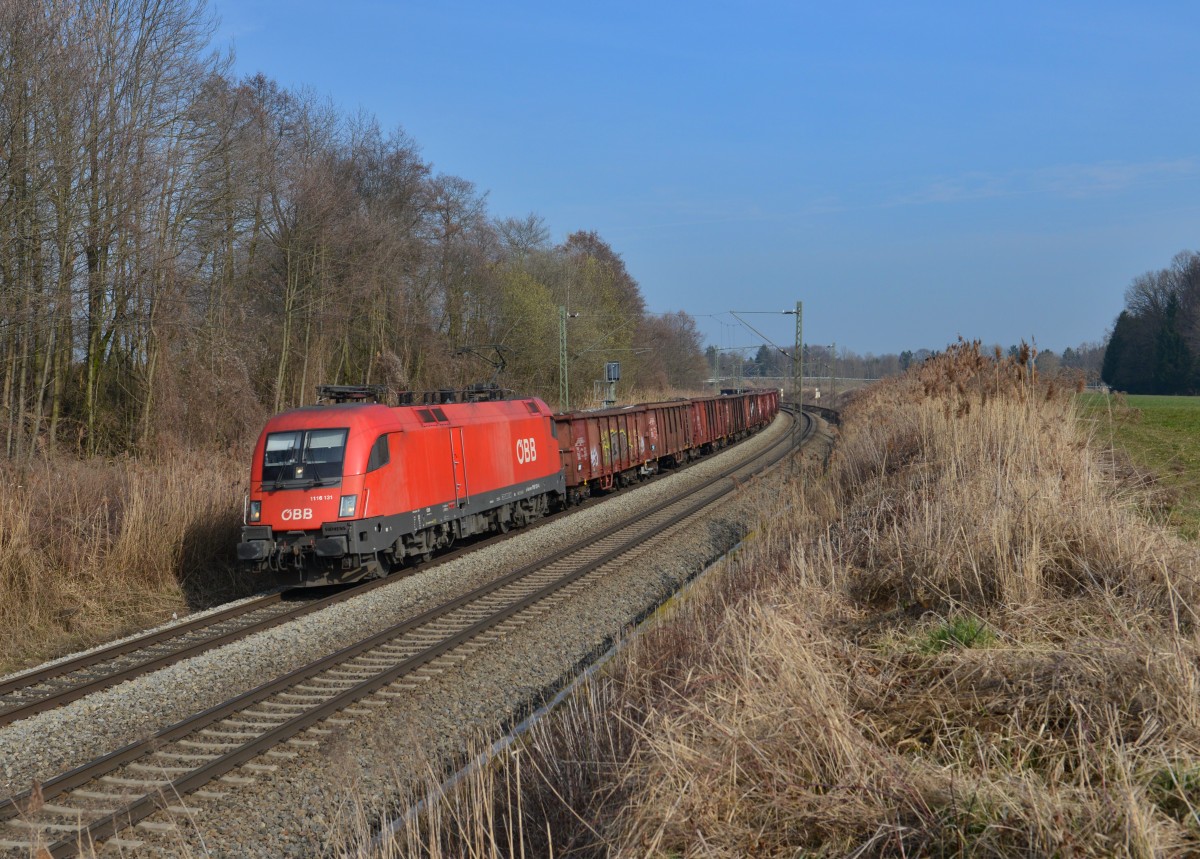1116 131 mit einem Güterzug am 11.03.2014 bei Gutmart.