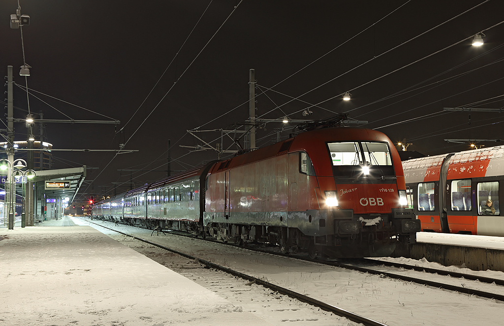 1116 139 waits to depart Innsbruck whilst working EN246, 2247 Wien-Bregenz, 2 February 2015