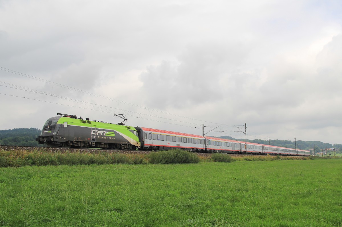 1116 141  City-Airport-Train  mit einem EC aus Frankfurt bei Bernau am Chiemsee, aufgenommen am 27. August 2013.