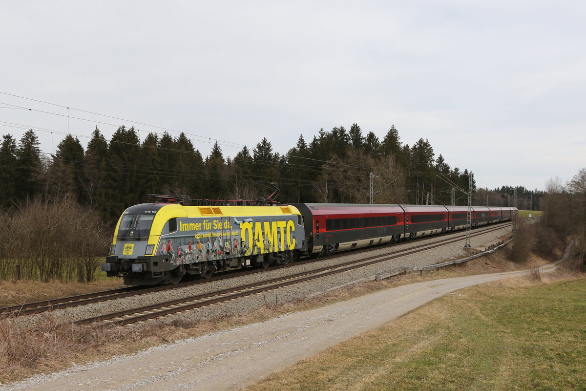 1116 153  ÖAMTC  war mit einem  Railjet  am 3. März 2021 bei Grabenstätt im Chiemgau in Richtung Rosenheim unterwegs.