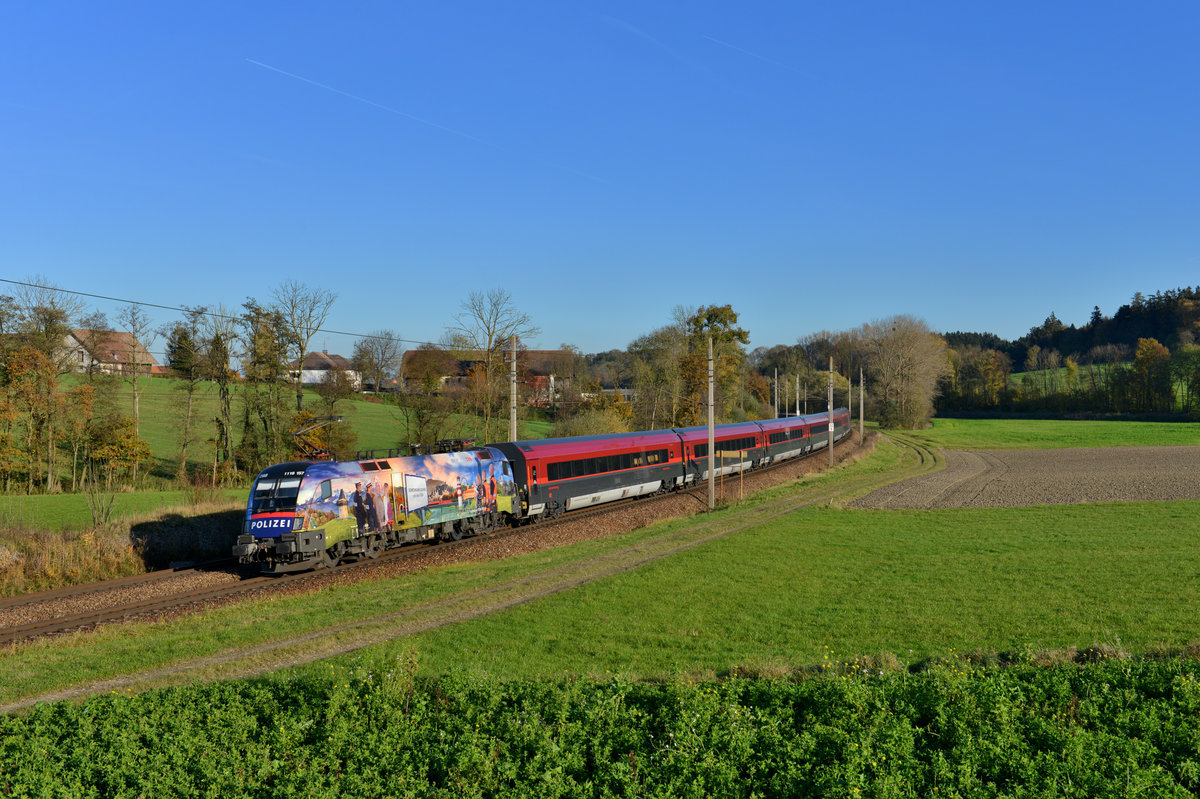 1116 157 mit einem Railjet am 31.10.2016 bei Kimpling. 