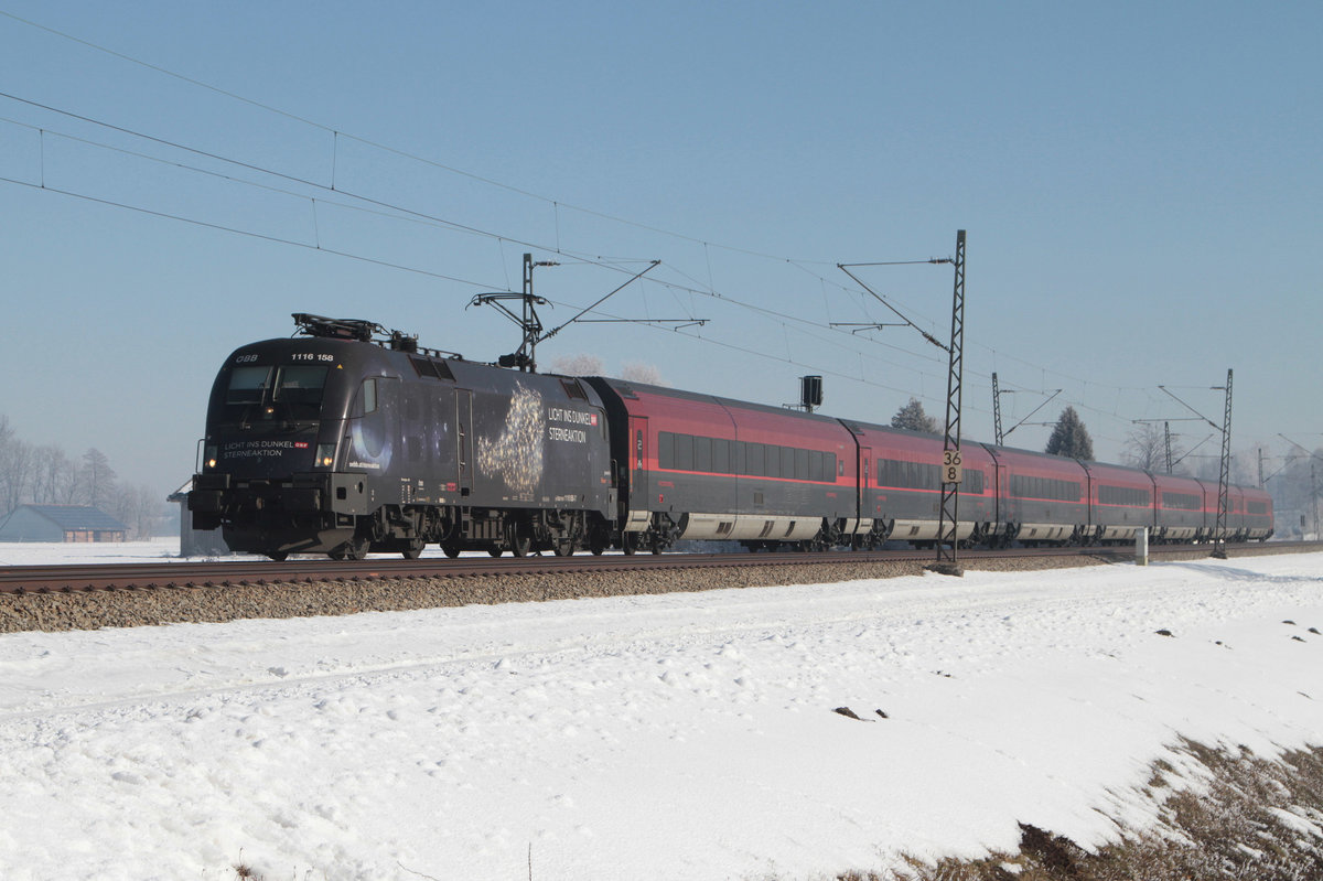 1116 158 (Licht ins Dunkel) mit dem RJ662 Richtung Kufstein am 29.01.2017 bei Übersee