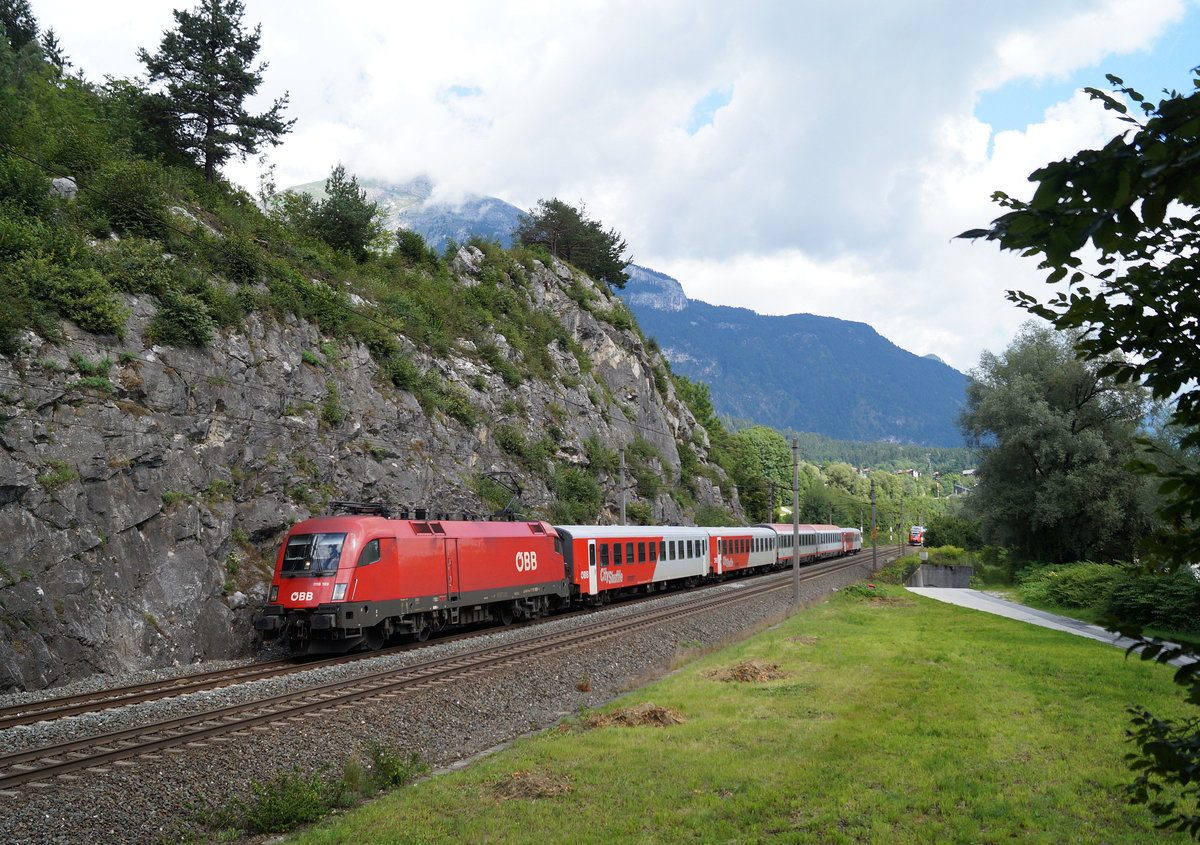 1116 169 mit dem REX 35216 (Wörgl Hbf - Innsbruck Hbf) bei Wiesing, 14.08.2019.