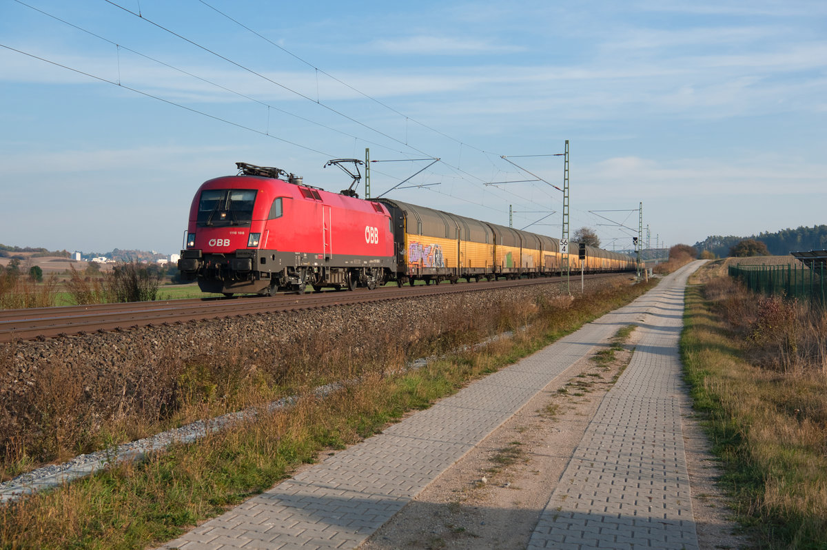 1116 186 mit einem ARS Altmann Autotransportzug bei Lehrberg Richtung Würzburg, 09.10.2018