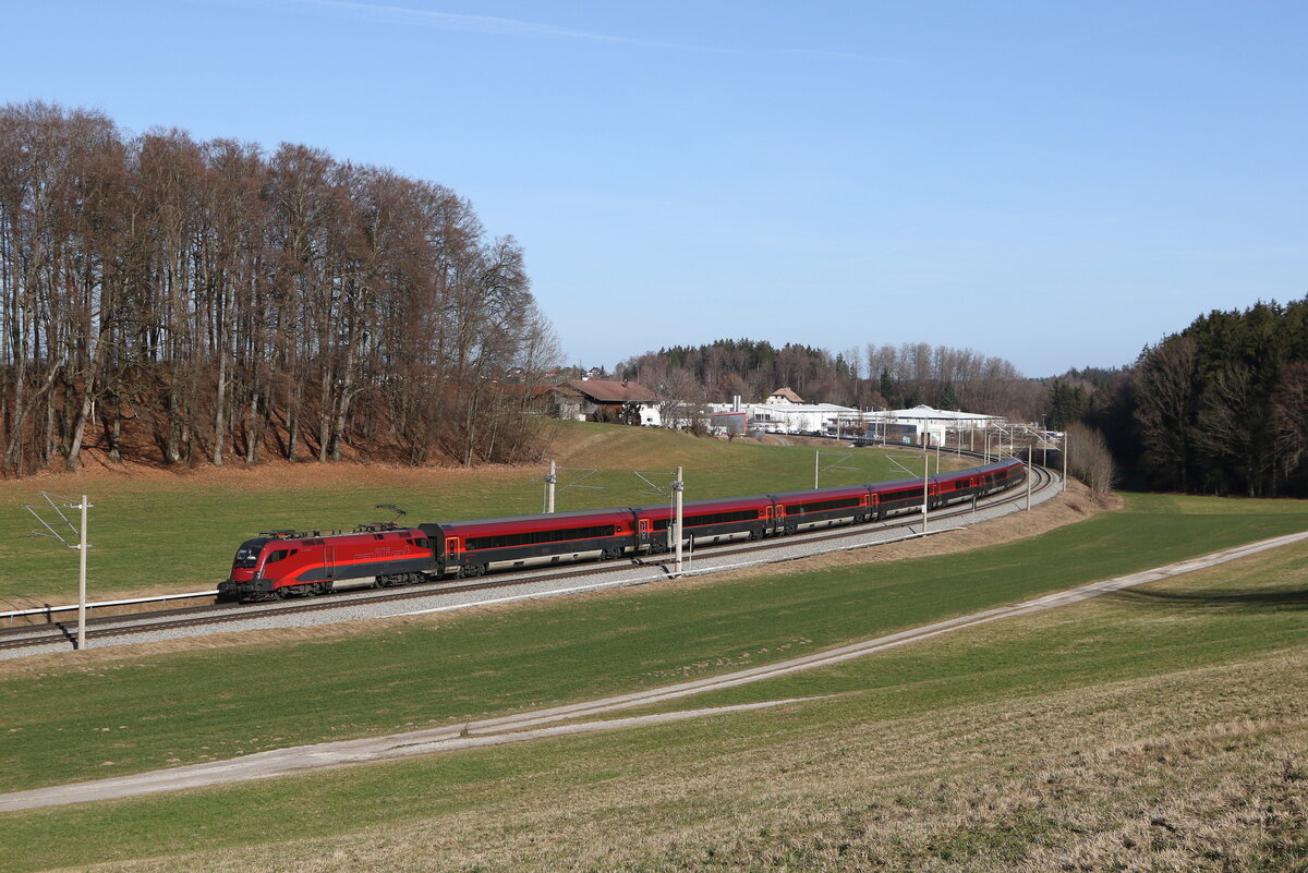 1116 213 war am 5. Februar 2024 bei Axdorf im Chiemgau in Richtung Rosenheim unterwegs.