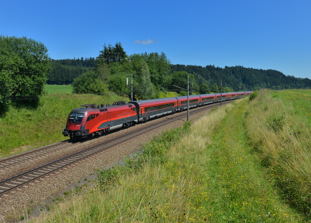 1116 214 mit RJ 564 am 03.08.2015 bei Pöndorf. 
